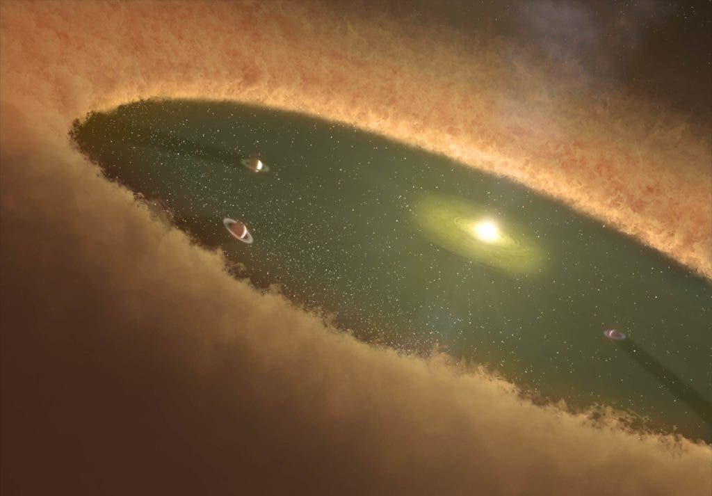 Artist impression of an early solar system. Credit: NASA.