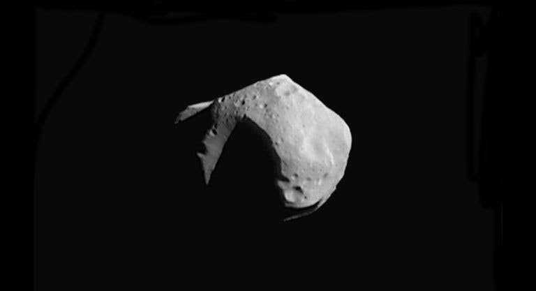 This image mosaic of asteroid 253 Mathilde is constructed from four images acquired by the Near Earth Asteroid Rendezvous (NEAR) spacecraft on June 27, 1997. Image Credit: NASA/JPL