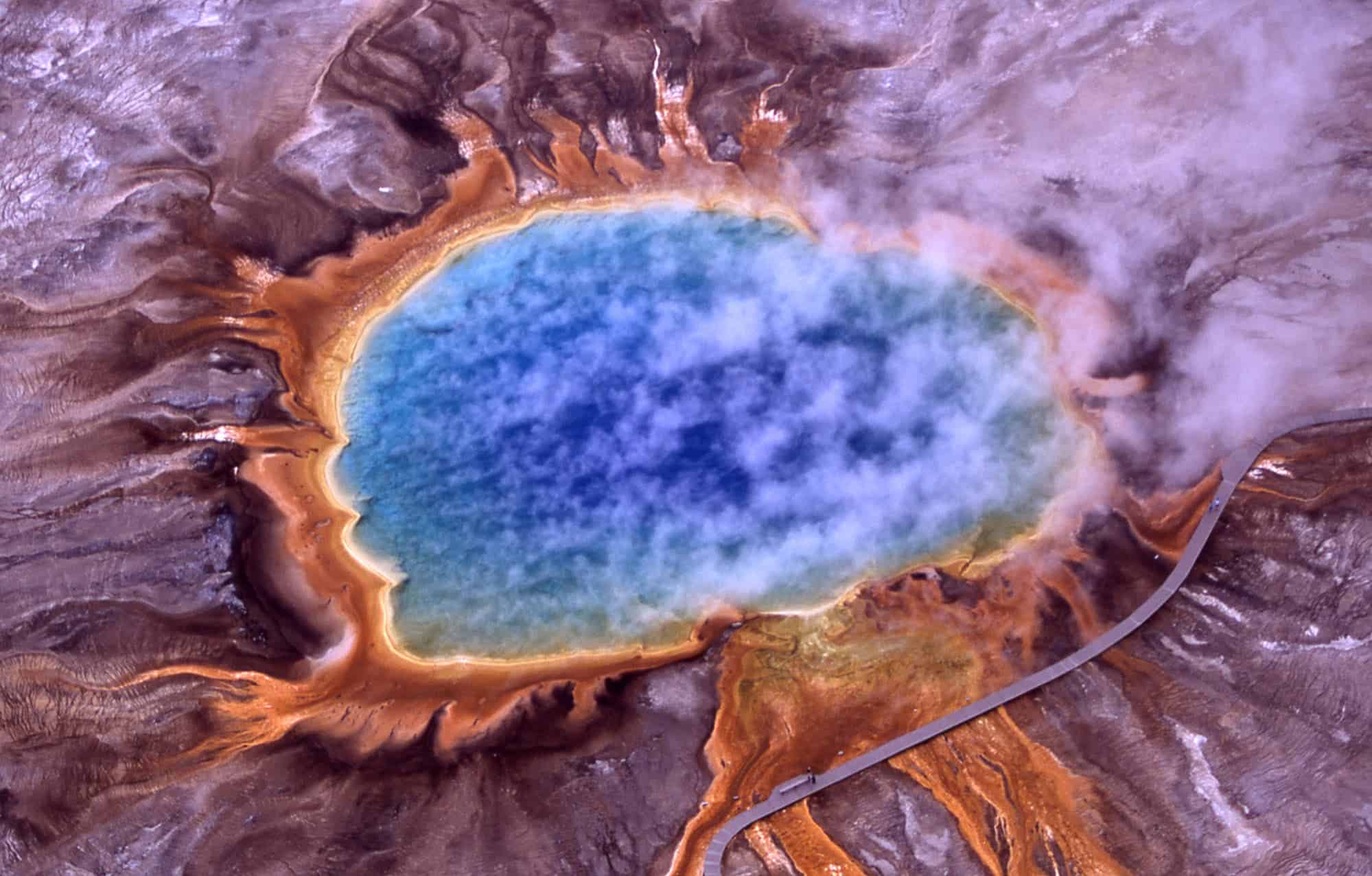 Archaeobacteria, one of the primary lineages of life on Earth, were first found in extreme environments, such as the Grand Prismatic Spring in Yellowstone depicted here. Image credits: Jim Peaco, NPS.