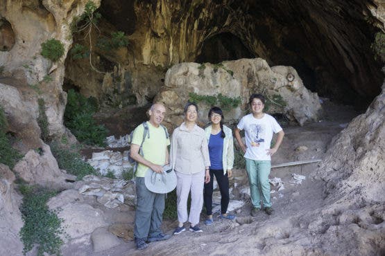 Standing in the entrance to Raqefet Cave, where they found evidence for the oldest man-made alcohol in the world, are, from left, Dani Nadel, Li Liu, Jiajing Wang and Hao Zhao. Image credits: Li Liu / Stanford.