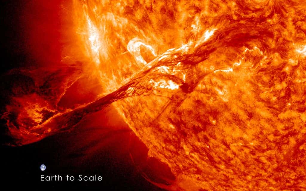 Depiction of a coronal mass ejection, with Earth to scale. Image credits: NASA / Goddard.