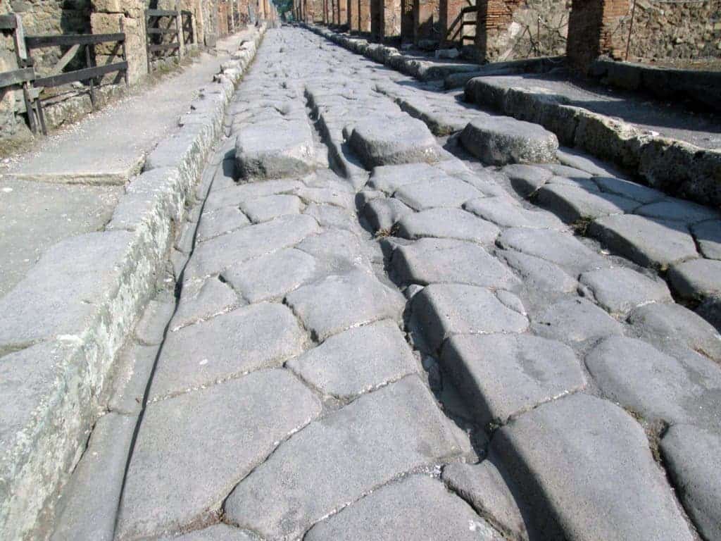 The passage of Roman carts eventually led to ruts in the road, as seen above. Credit: Eric Poehler.