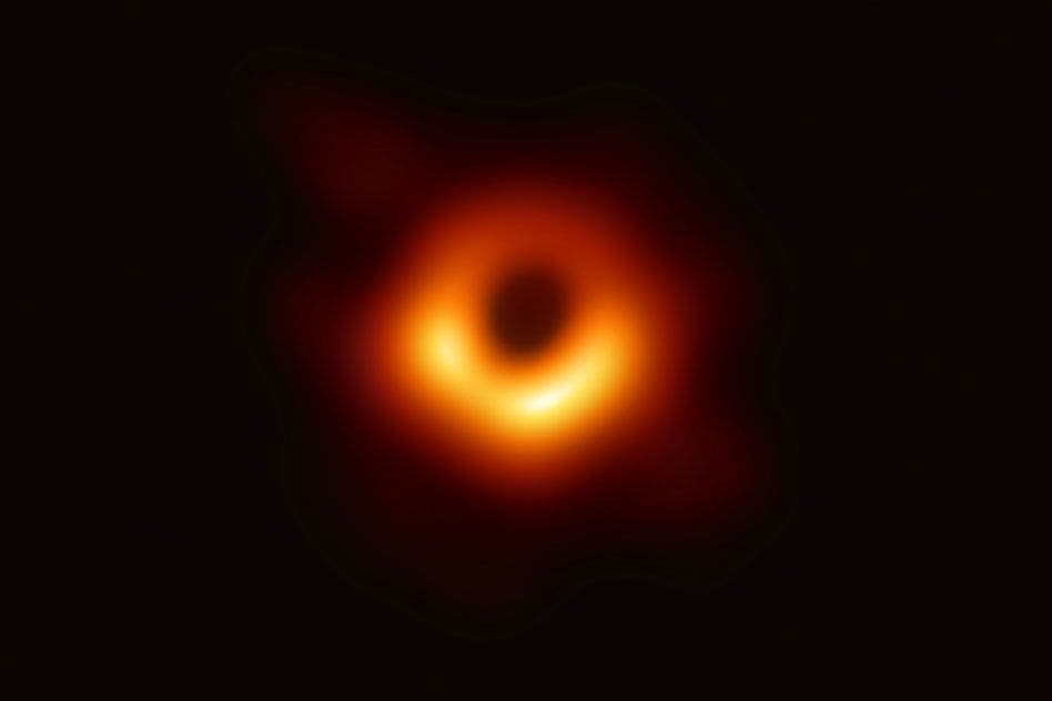 Picture showing the shadow of a black hole found at the center of galaxy M87. Credit: EHT Collaboration.
