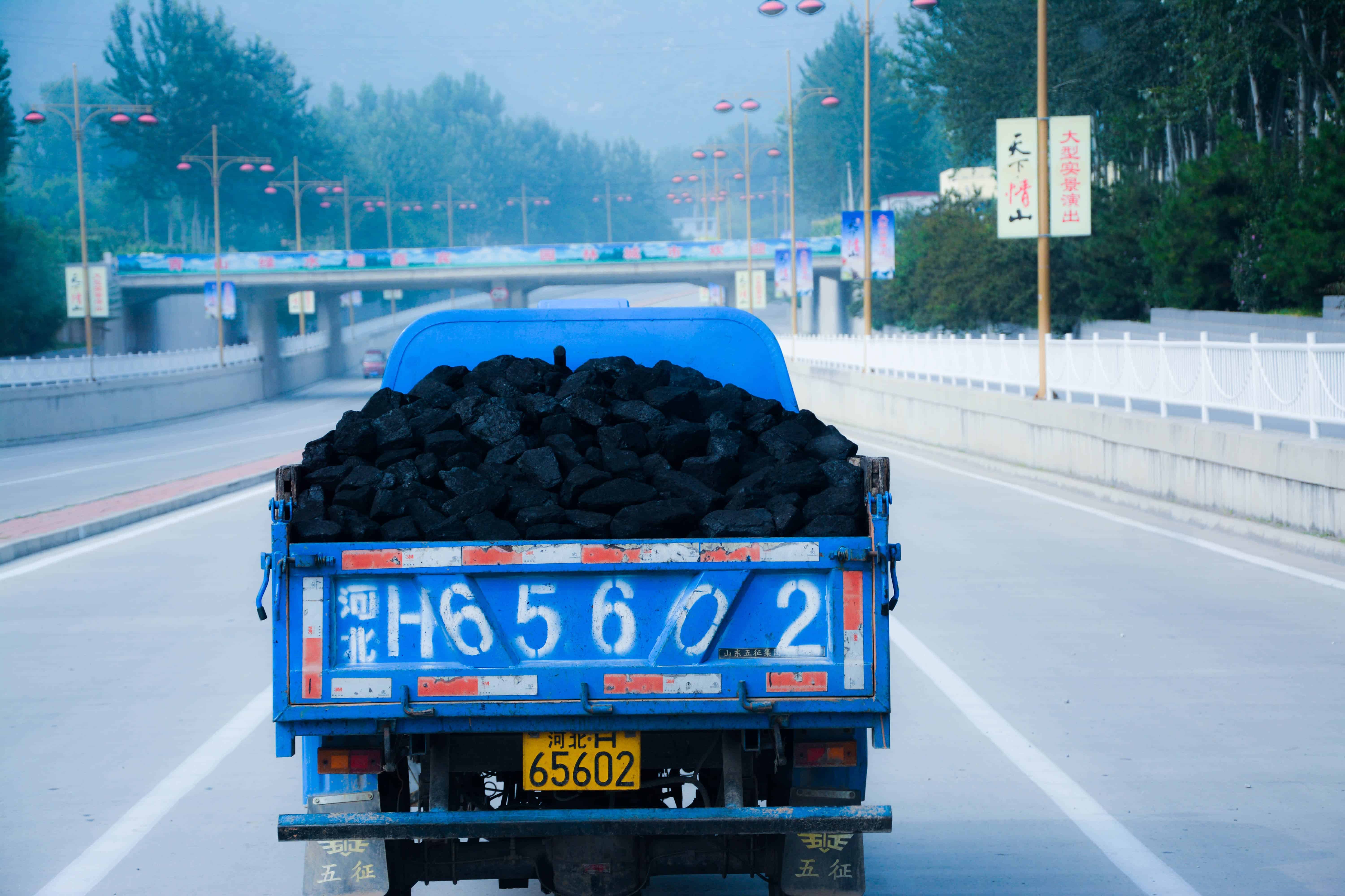 A truck transports coal in Beijing. Credit: Han Jun Zeng (Flickr)