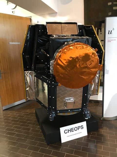 A replica of the CHEOPS telescope displayed at a press conference heled by the agencies responsible for the mission (Robert Lea)