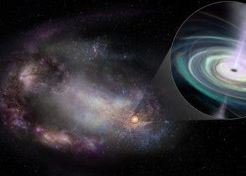 Artist’s conception of a dwarf galaxy, its shape distorted, most likely by a past interaction with another galaxy, and a massive black hole in its outskirts (pullout). The black hole is drawing in material that forms a rotating accretion disc and generates jets of material propelled outward. Image credit: Sophia Dagnello, NRAO/AUI/NSF