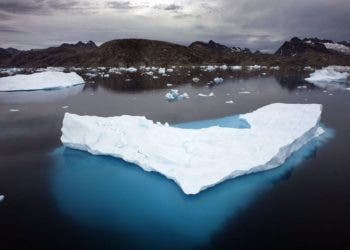 Icebergs float in a bay off Ammassalik Island, Greenland on July 19, 2007. A new report from the international medical journal The Lancet says a child born today will never know a life where their health isn't placed at risk by a warming planet. THE CANADIAN PRESS/AP, John McConnico