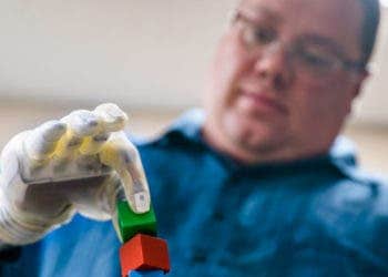 Joe Hamilton of Flint, Mich. intuitively controls a DEKA prosthetic hand—made by Mobius Bionics and called the “LUKE Arm”—for an advanced prosthetics  study involving the Regenerative Peripheral Nerve Interface, or RPNI, in a lab on the University of Michigan Medical Campus in Ann Arbor, MI on August 9, 2018.Photo: Evan Dougherty/University of Michigan Engineering