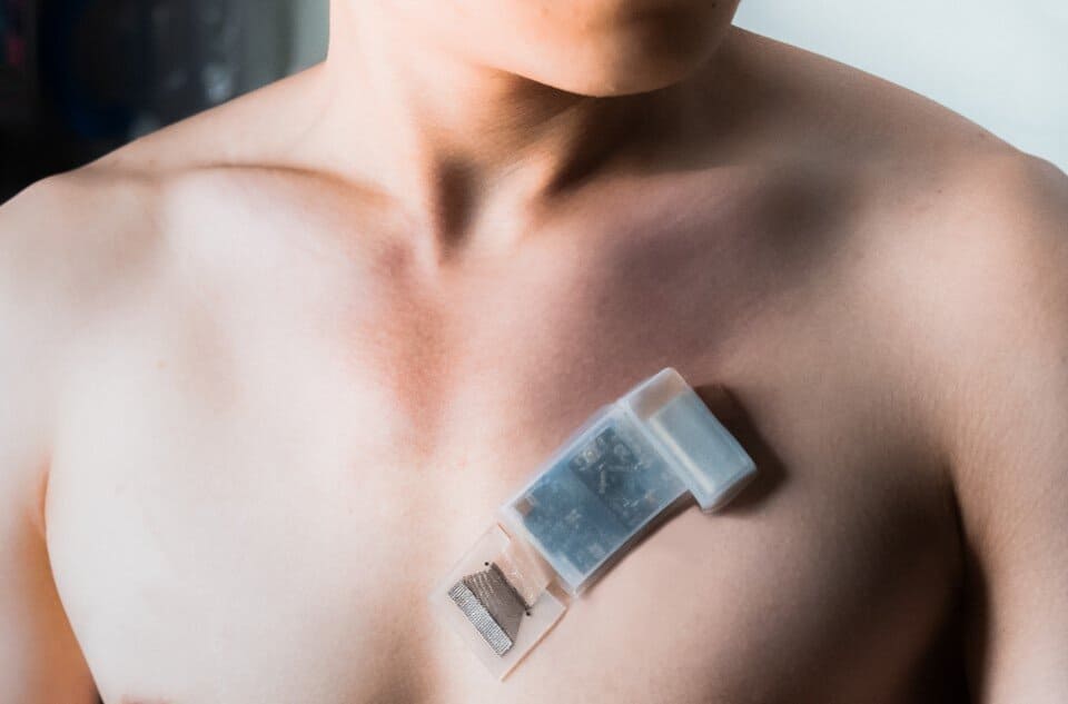 Medical device on man's bare chest