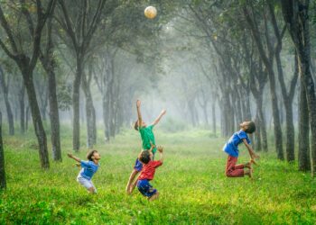 Children playing in a field.