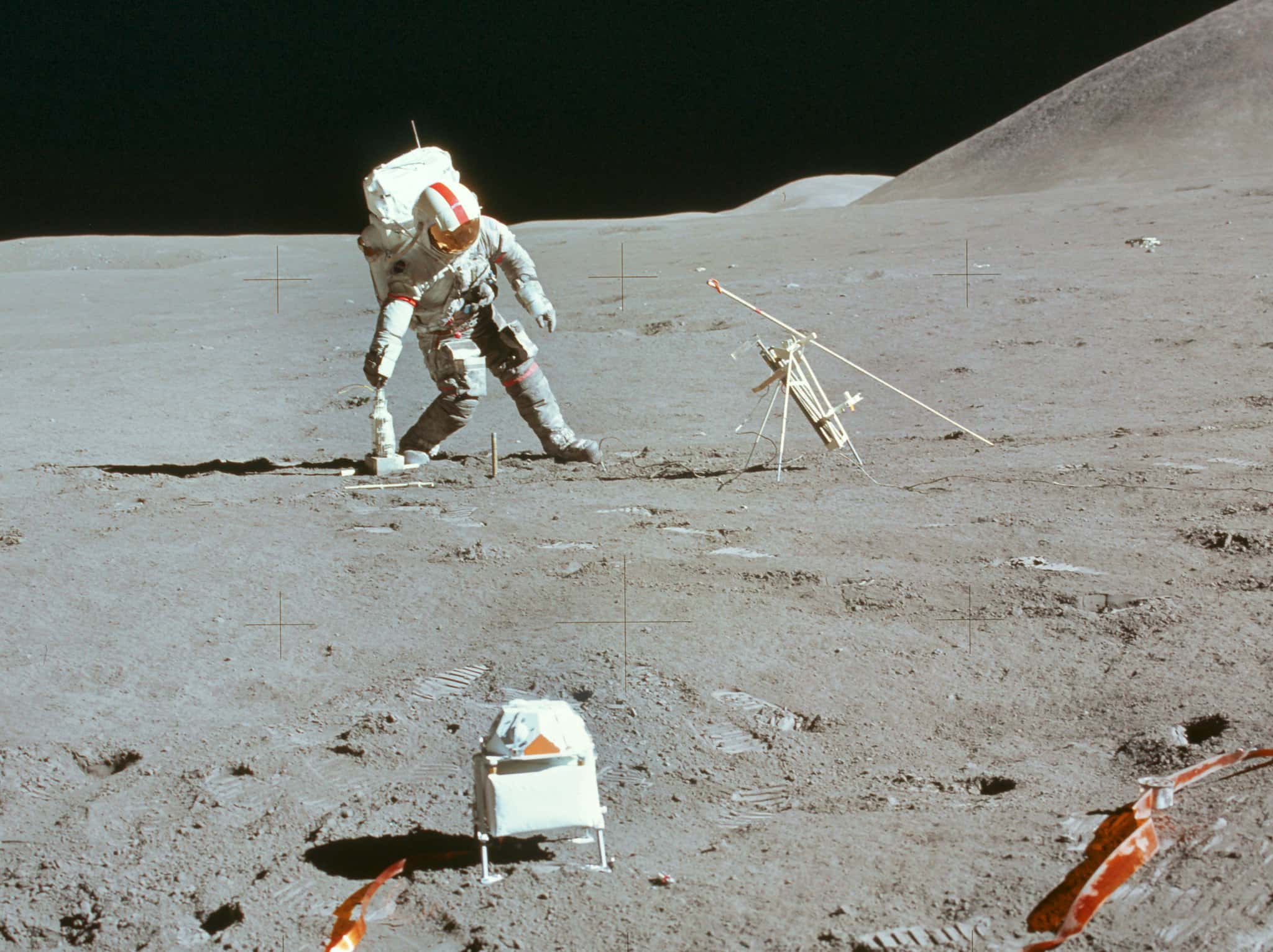 astronaut walking on lunar soil