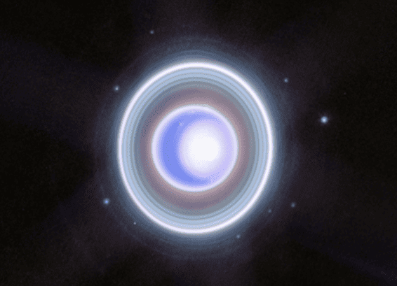  Uranus’ seasonal north polar cap and dim inner and outer rings
