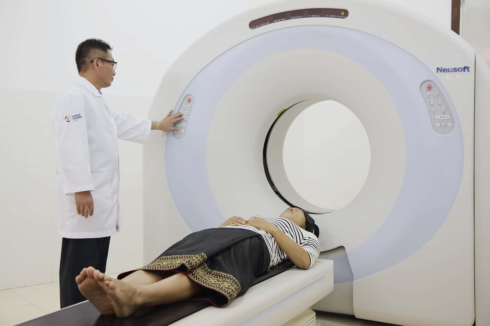 CT Scan scanner, radiographer and patient