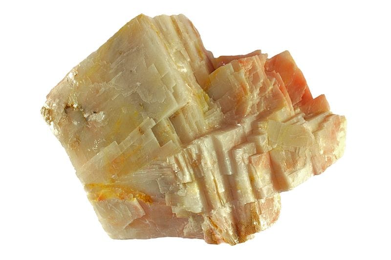 Calcite crystals showing rhombohedral cleavage. 