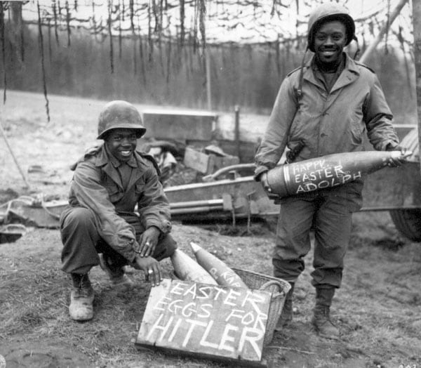 US Soldiers with inscribed artillery wishing Adolph Hitler a happy Easter.