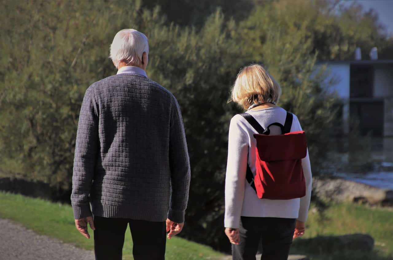 Elderly couple strolling in nature