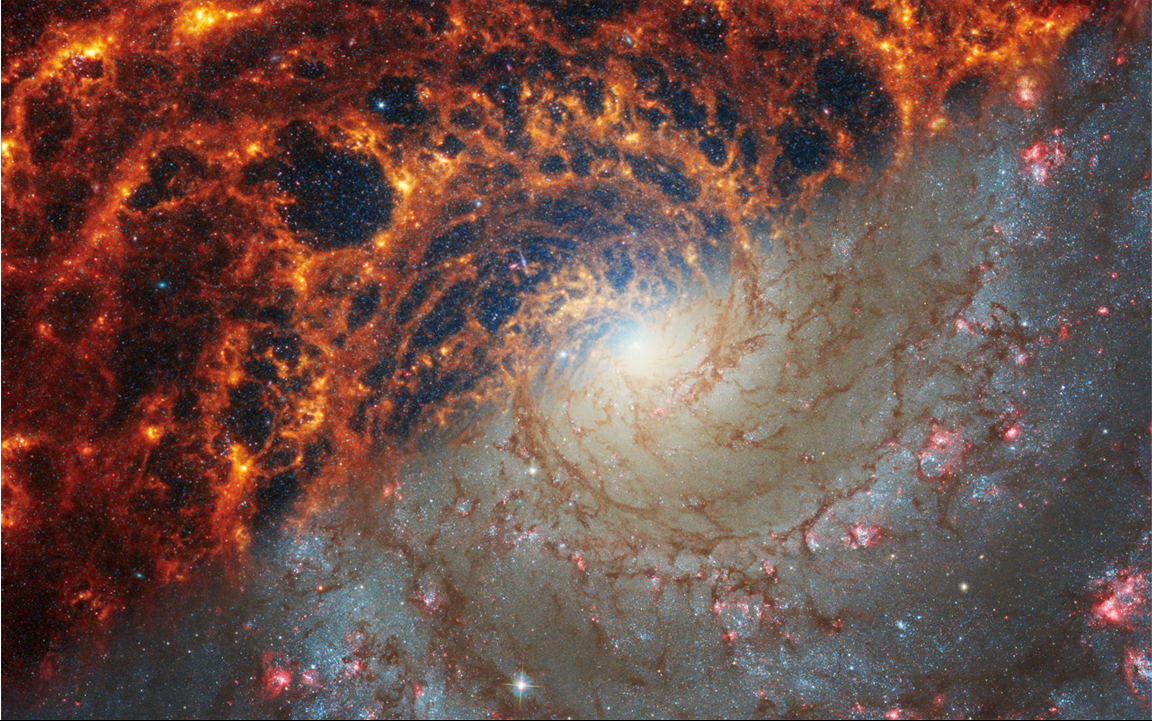 Face-on spiral galaxy, NGC 628, as seen by Hubble and by JWST
